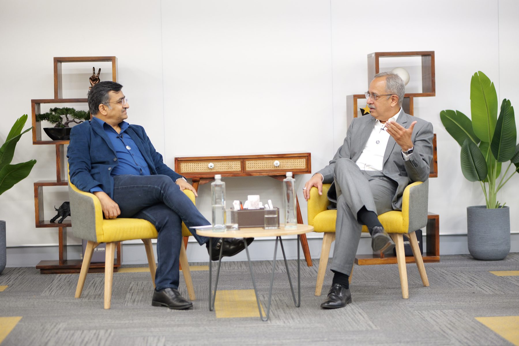 A senior coach and leader in conversation during a private 1:1 session